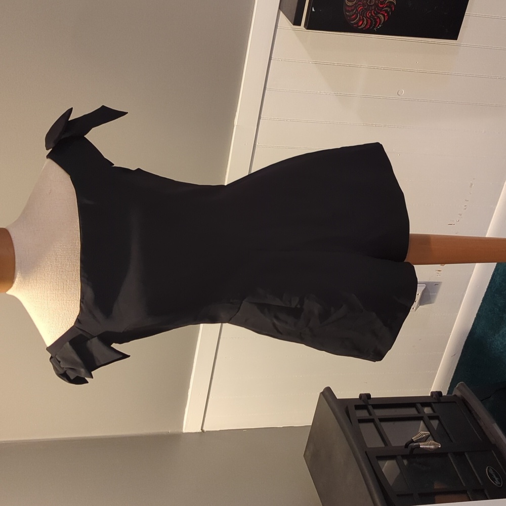 Black off the shoulder romper.